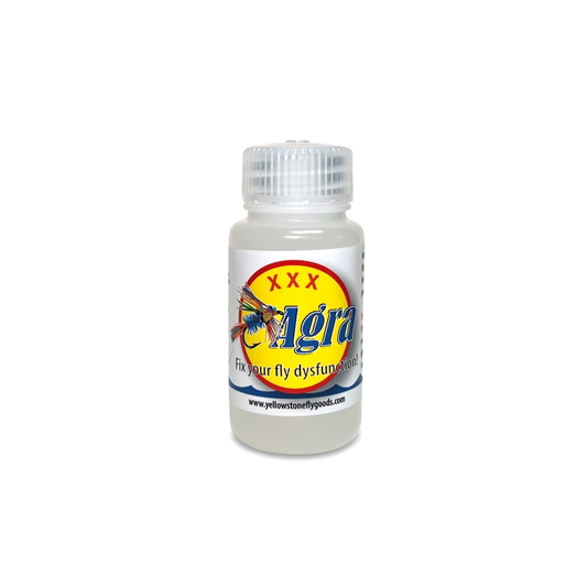A small bottle with a white label, predominantly white liquid inside, with a cap, and a red and yellow logo that reads 'XXX AGRA'.